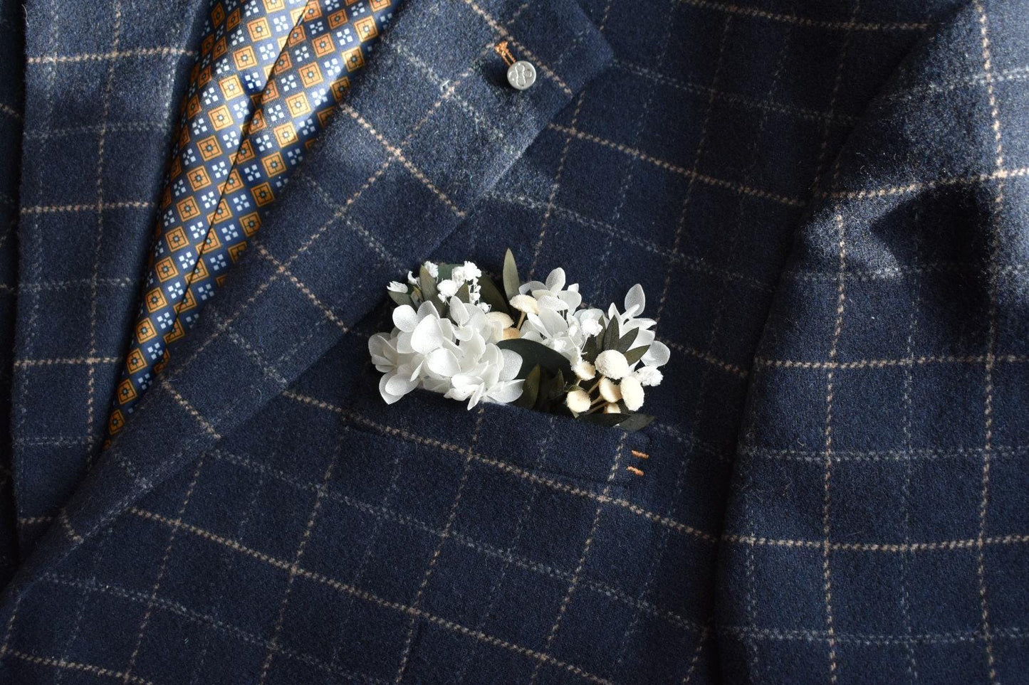 White hydrangea pocket boutonniere