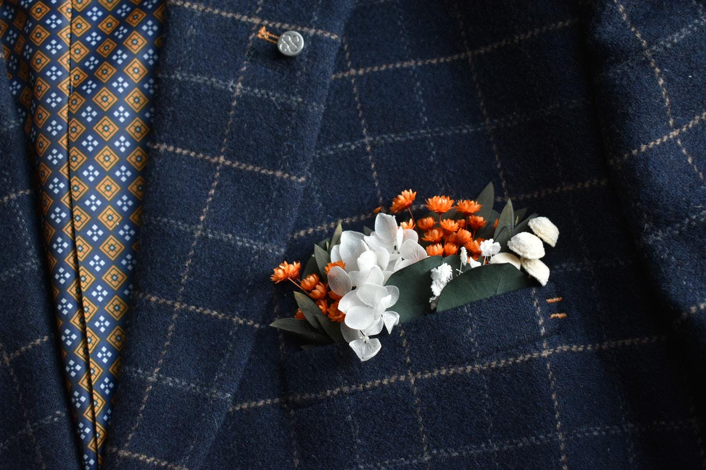 Orange pocket boutonniere