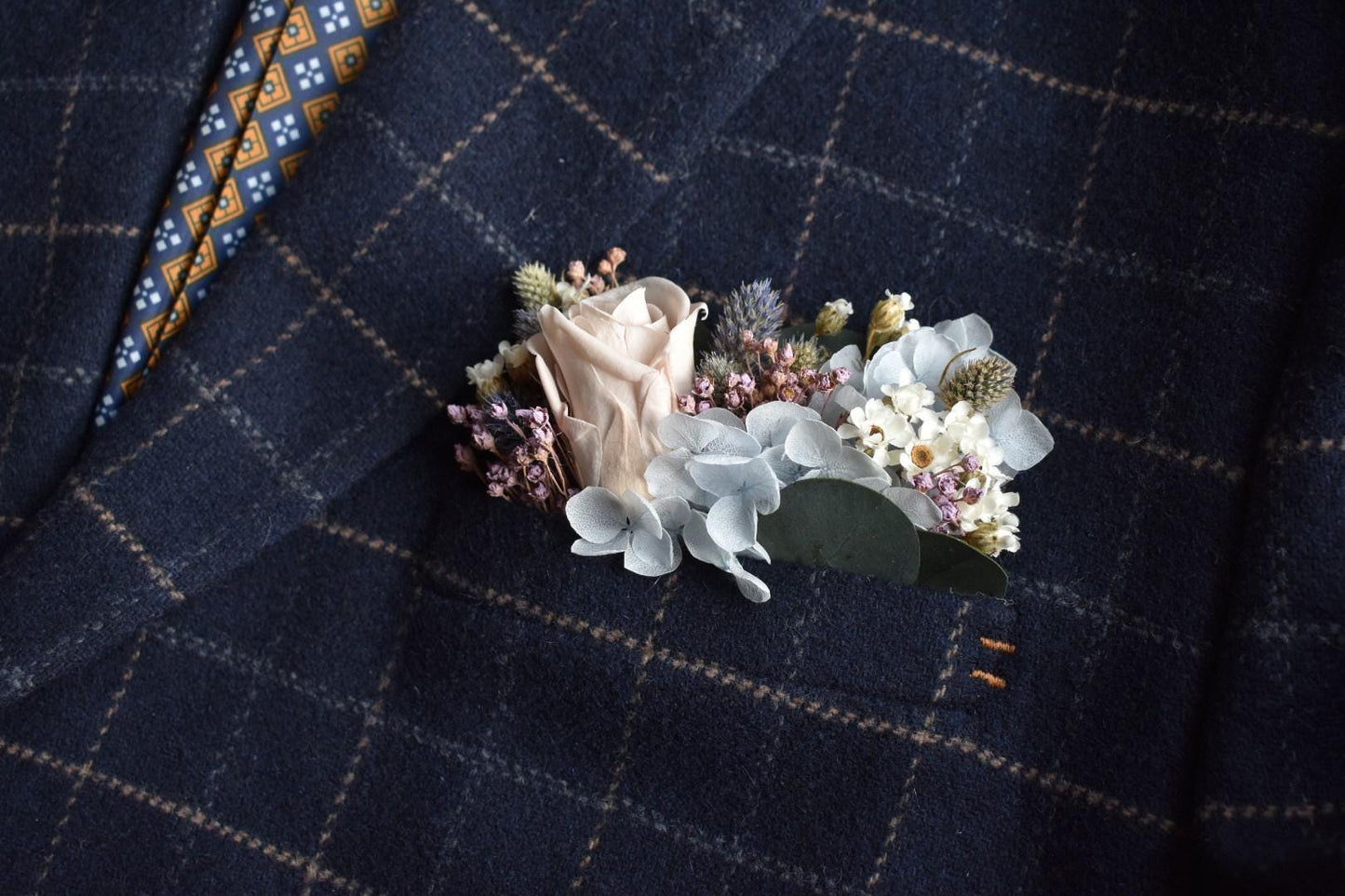 Pale blue and purple pocket boutonniere