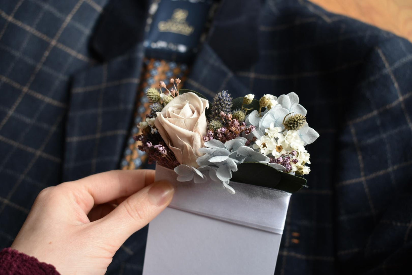 Pale blue and purple pocket boutonniere