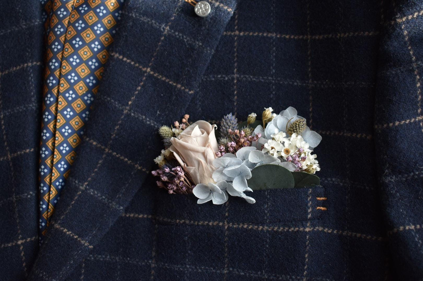 Pale blue and purple pocket boutonniere