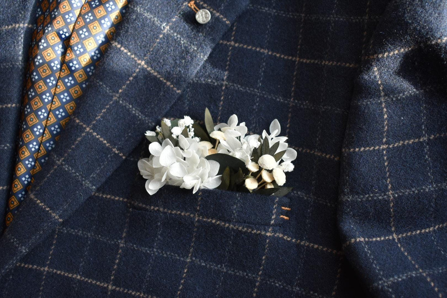 White hydrangea pocket boutonniere