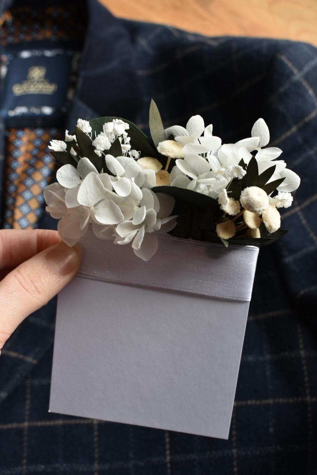 White hydrangea pocket boutonniere