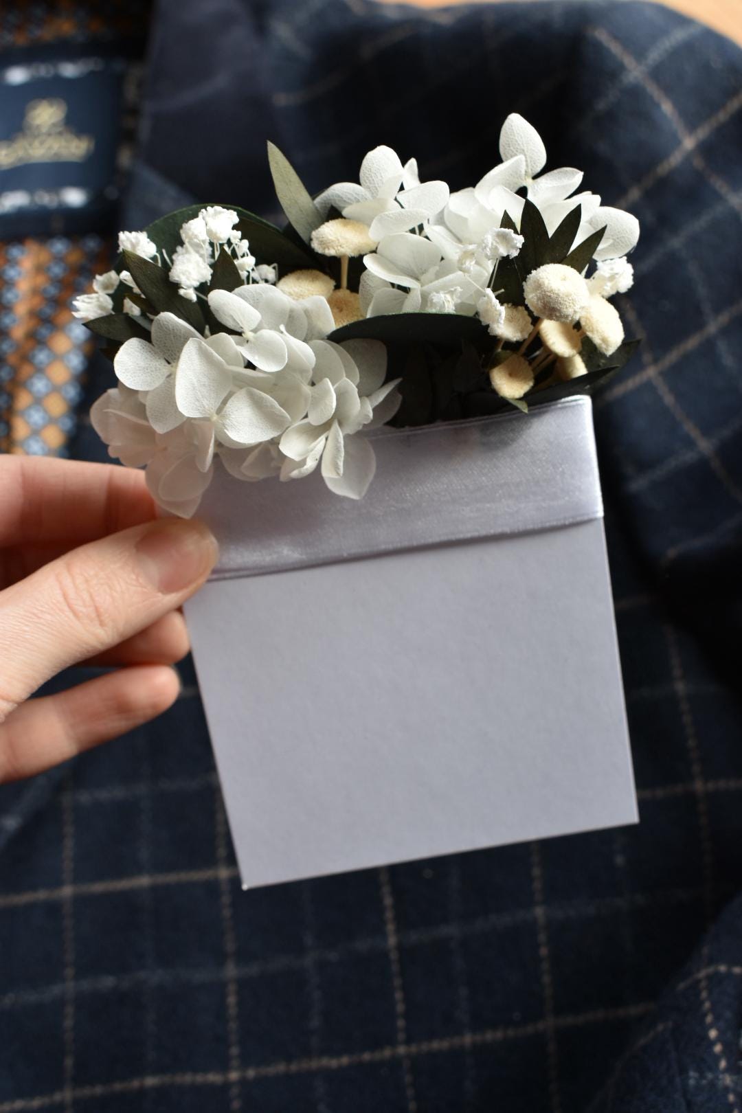 White hydrangea pocket boutonniere