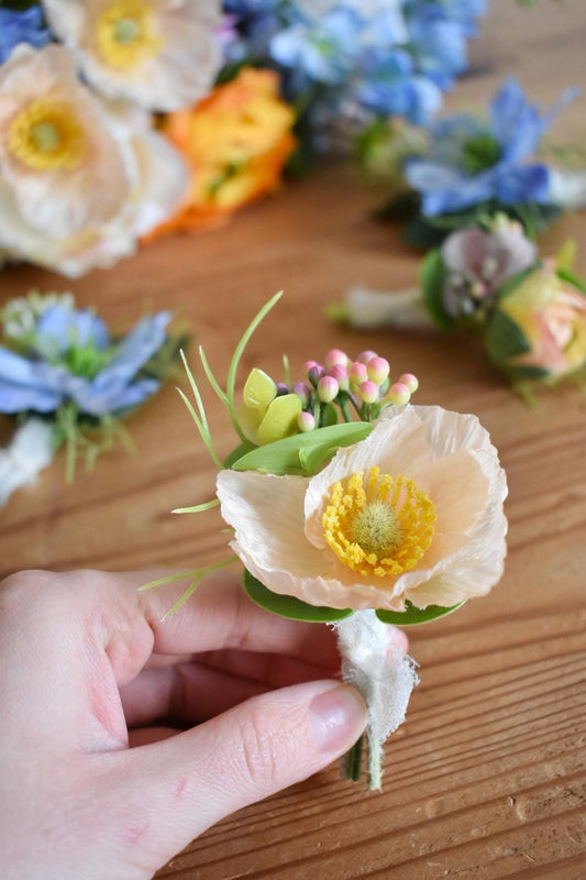 Peach poppy button hole