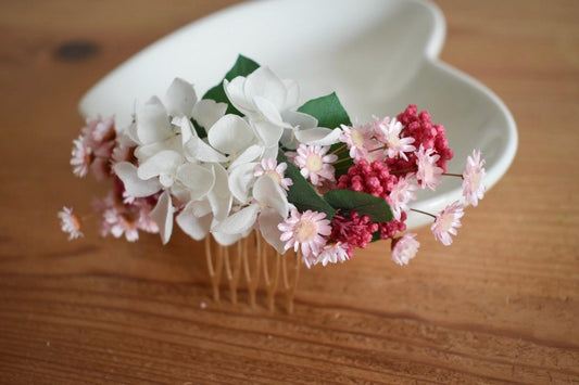 Pink and white floral hair comb