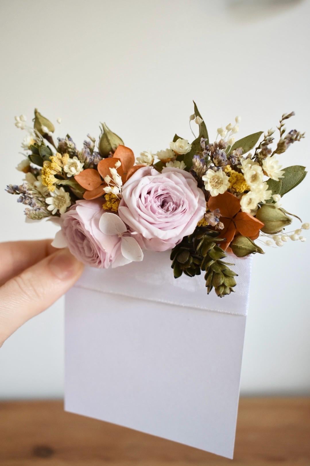 Pink rose mixed pocket boutonniere