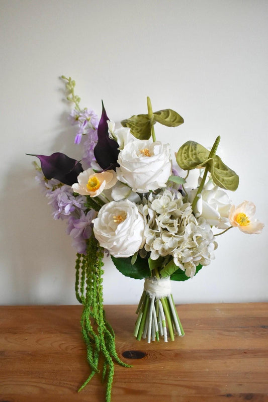 Trailing amaranthus wedding bouquet with anthuriums