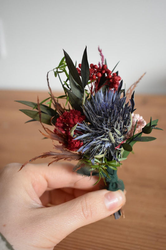 Large colourful winter boutonniere
