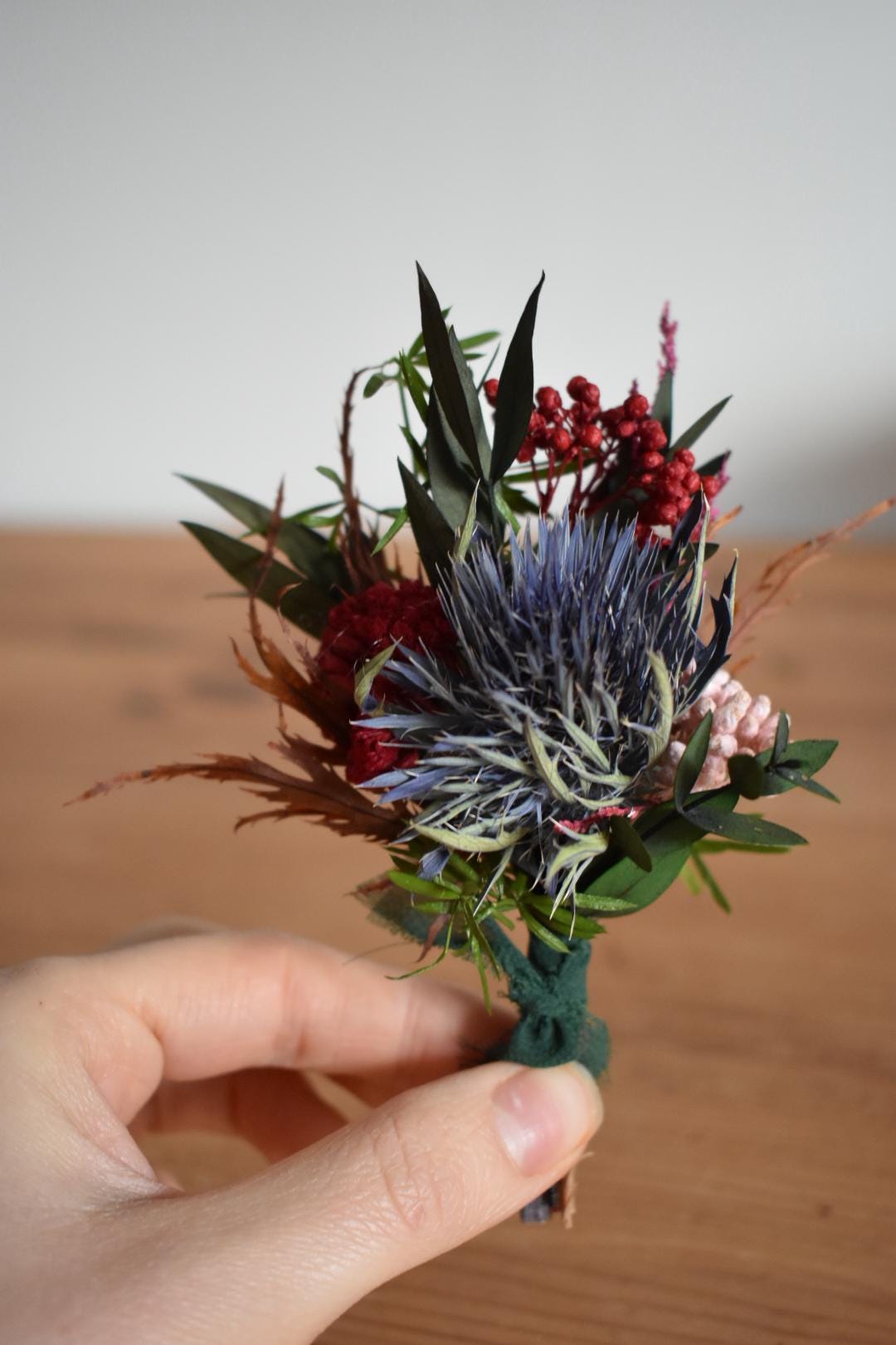 Large colourful winter boutonniere