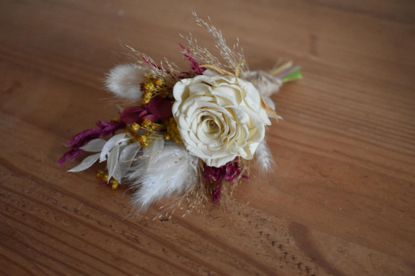 Deep and yellow boutonniere