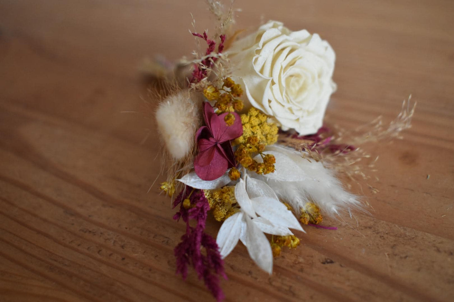 Deep and yellow boutonniere