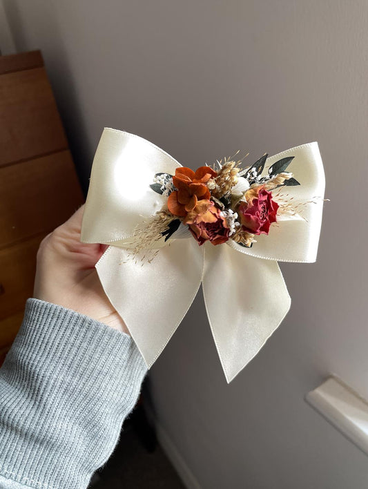 Orange dried flower bow hair clip