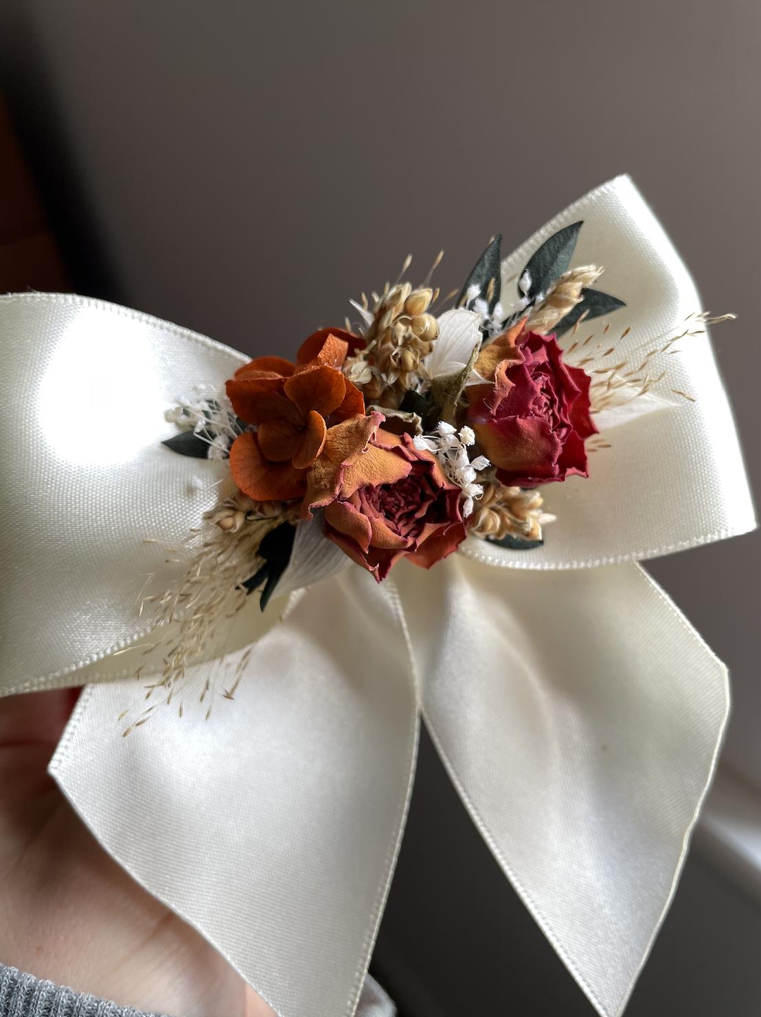 Orange dried flower bow hair clip