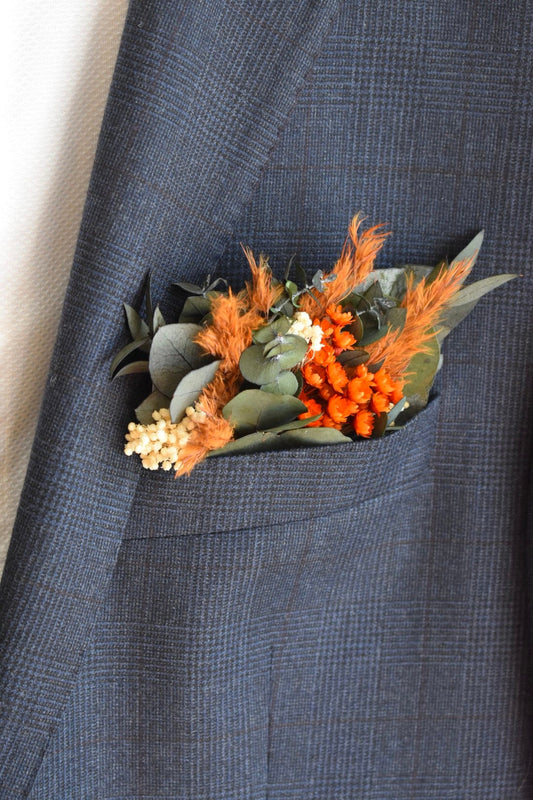 Orange pampas pocket boutonniere