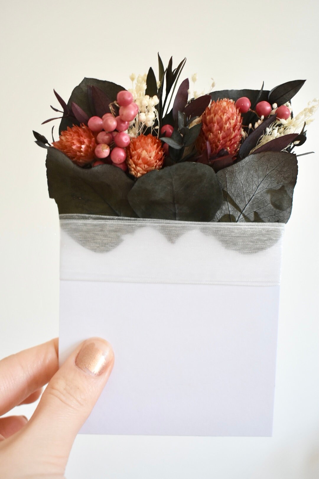 Pink berry pocket boutonniere