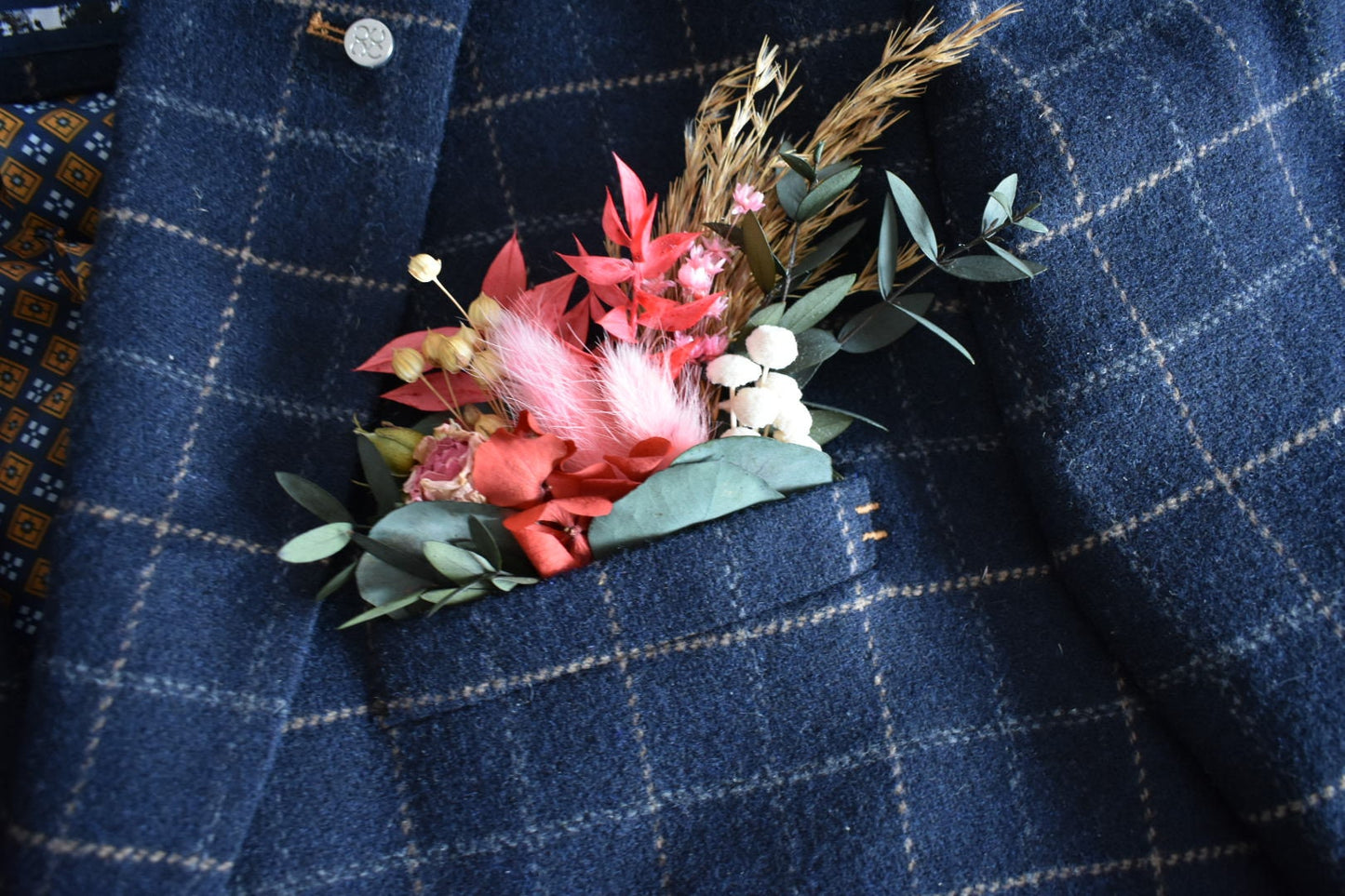 Pink and red pocket boutonniere