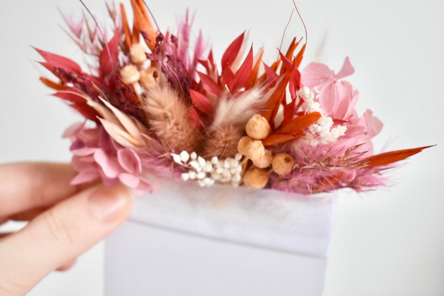 Pink and orange bright dried flower pocket boutonniere