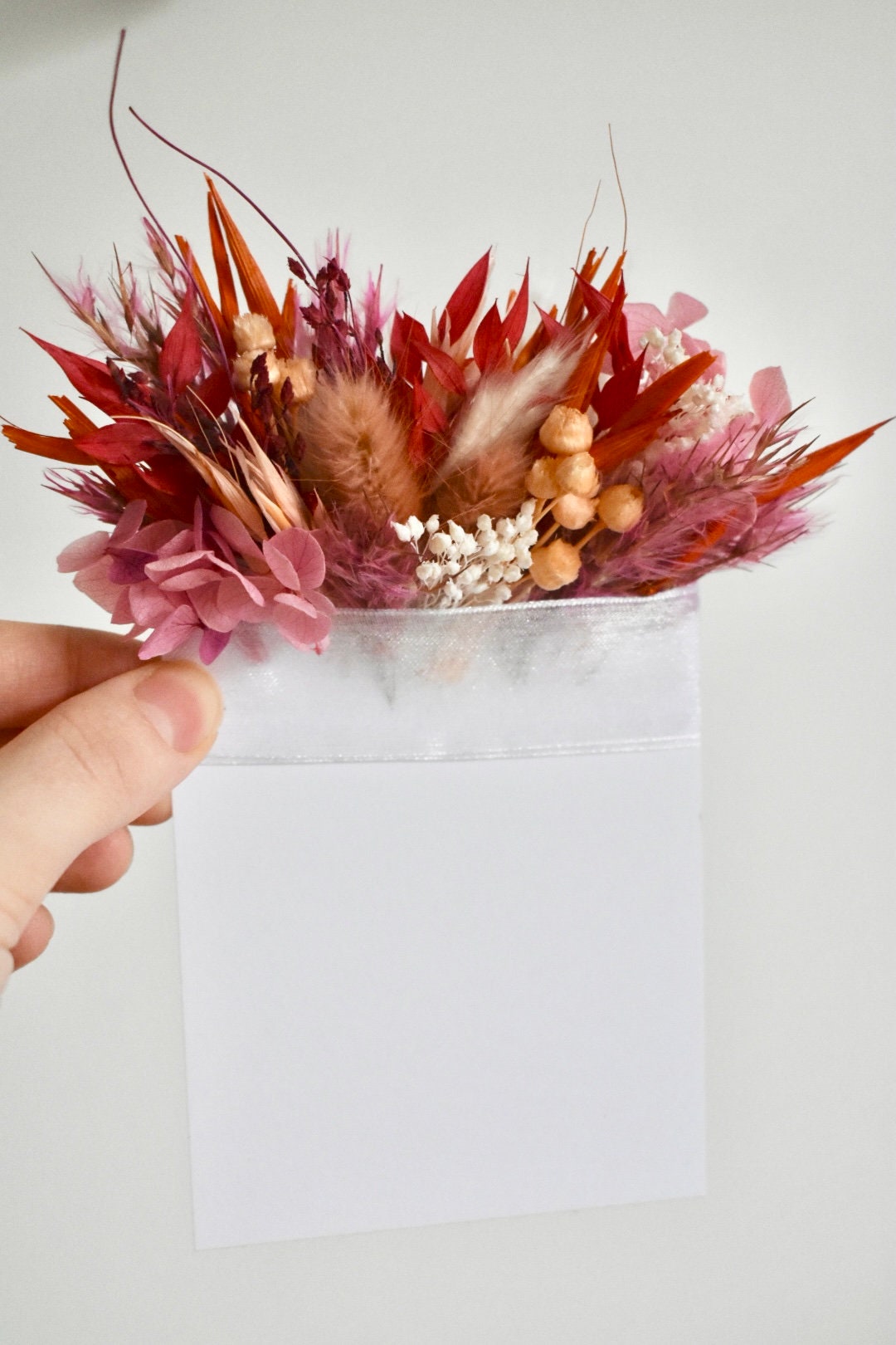 Pink and orange bright dried flower pocket boutonniere