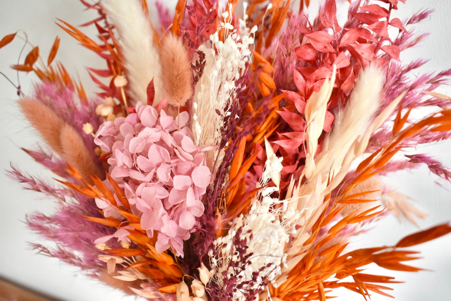 Pink and orange bright dried flower bouquet