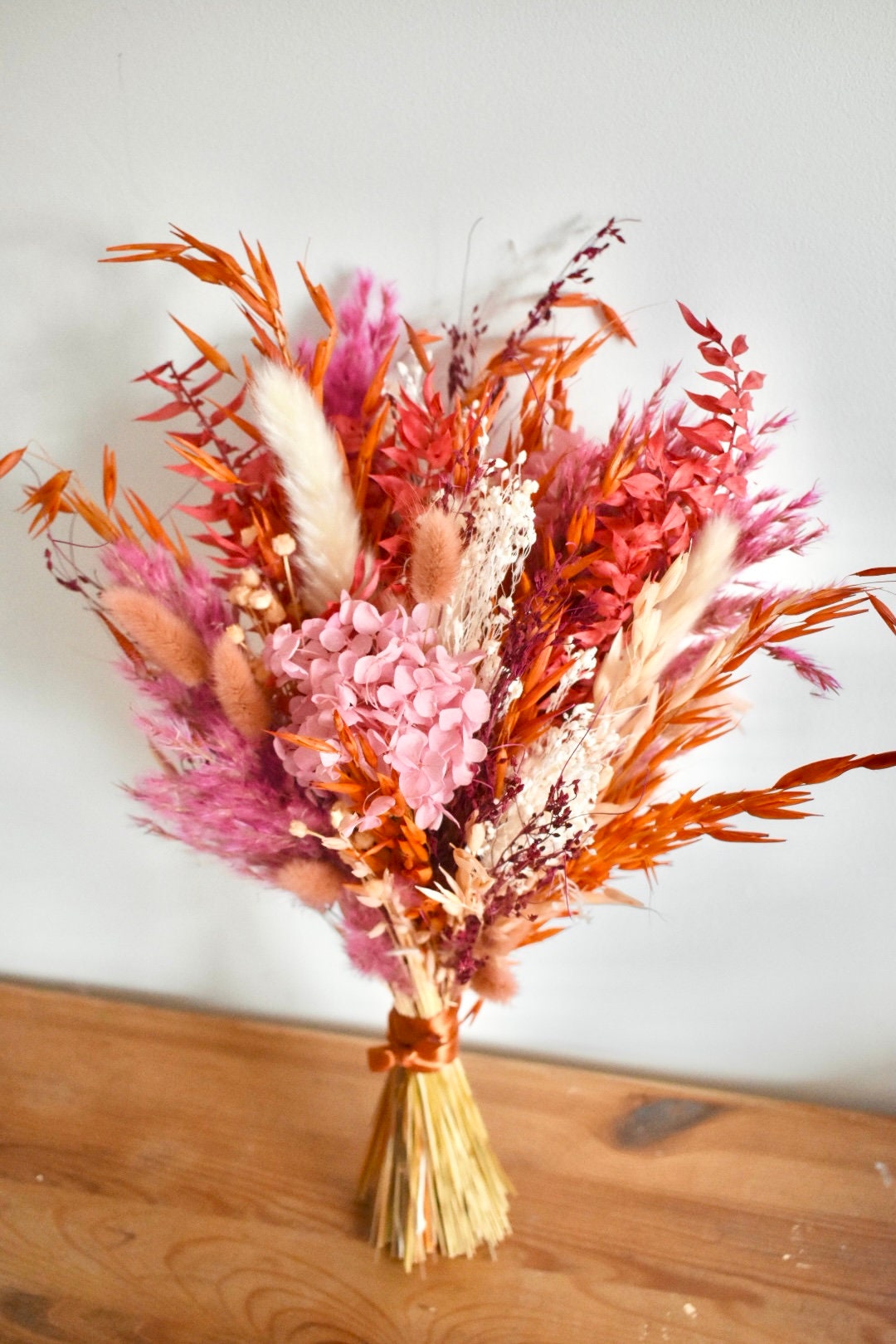 Pink and orange bright dried flower bouquet