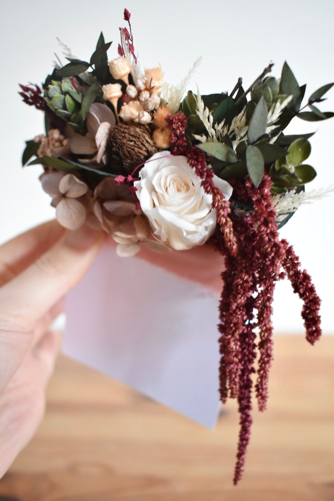 Rose, hydrangea and amaranthus statement pocket boutonniere